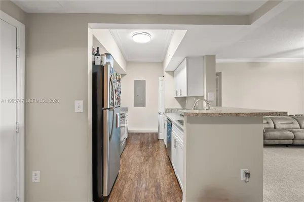 a bathroom with a sink a mirror and a toilet
