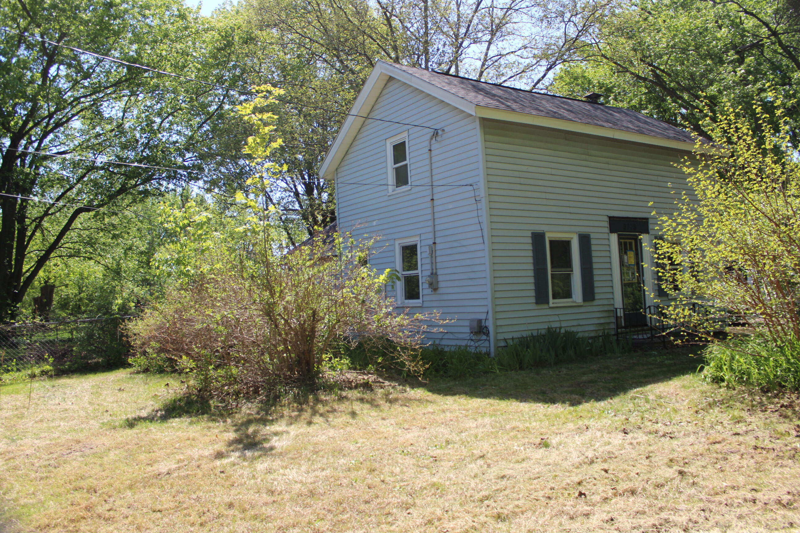 3743 South Ravenna Road Ravenna, MI 49451 - Photo 2 of 11 SIDE LEFT