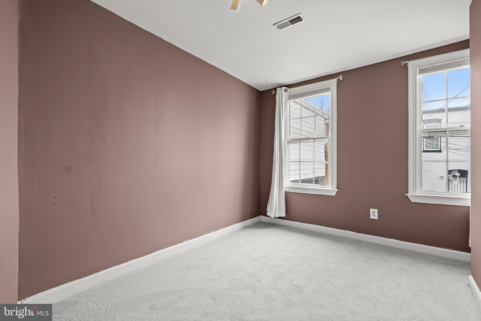 1648 Kramer Street Northeast Washington, DC 20002 - Photo 12 of 30 a view of an empty room with a window