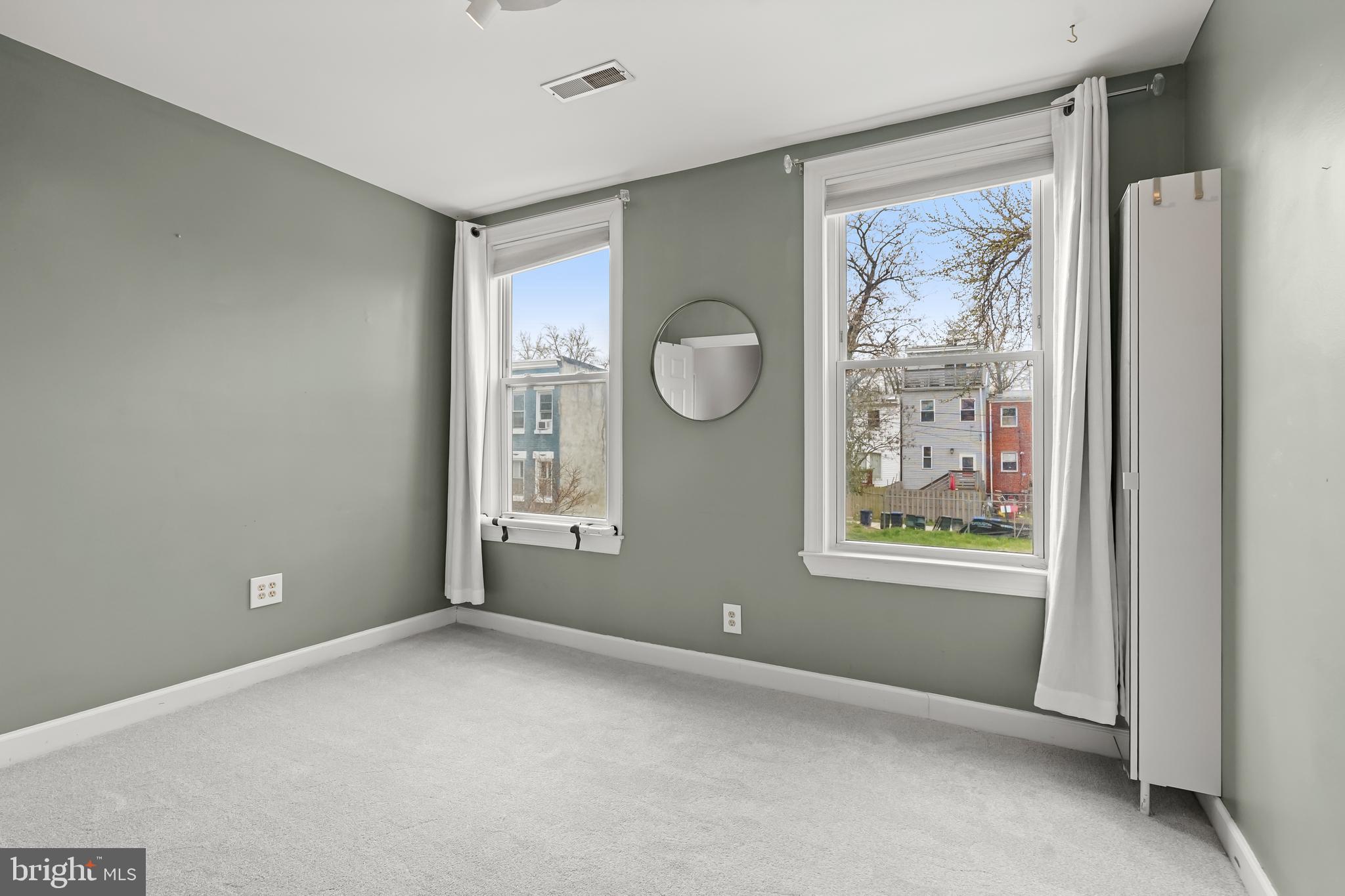1648 Kramer Street Northeast Washington, DC 20002 - Photo 15 of 30 a view of an empty room with a window