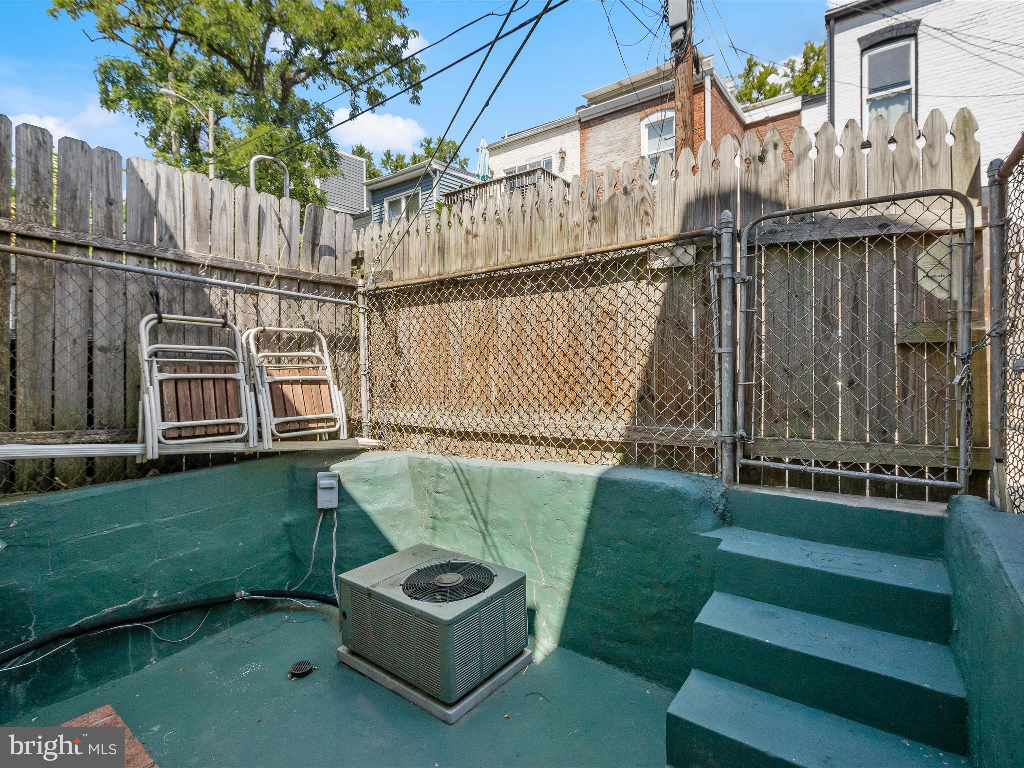 1648 Kramer Street Northeast Washington, DC 20002 - Photo 21 of 30 a view of a backyard with sitting area