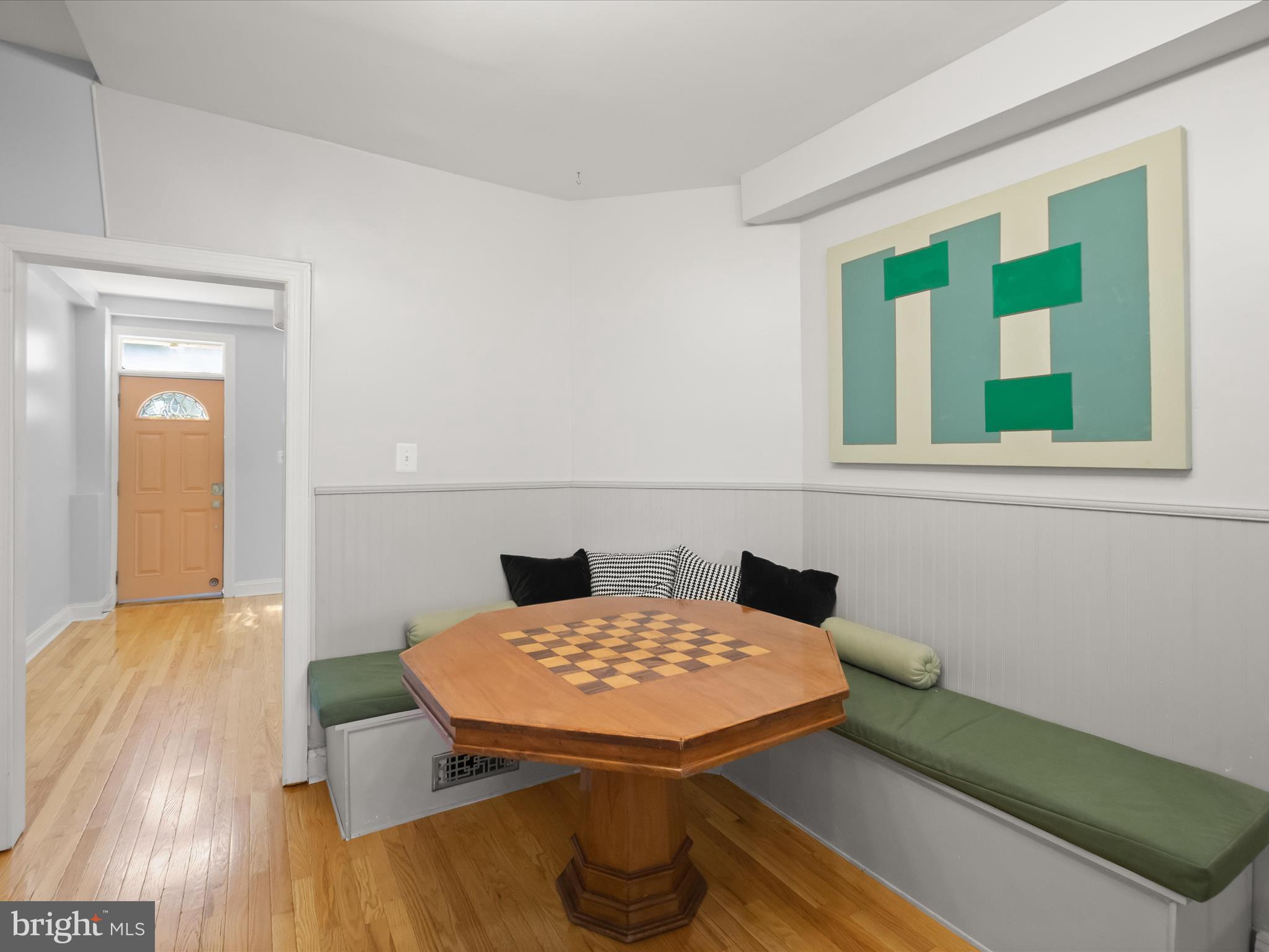1648 Kramer Street Northeast Washington, DC 20002 - Photo 6 of 30 a view of a room that has a table and a chair
