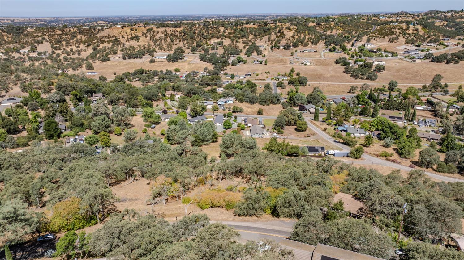 3721 Dunn Road Valley Springs, CA 95252 - Photo 8 of 14 an aerial view of house with yard and mountain view in back