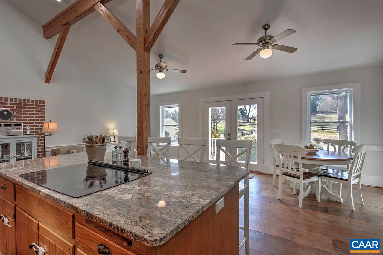 481 Beautiful Run Road Rochelle, VA 22738 - Photo 15 of 45 a view of a dining room with furniture window and wooden floor