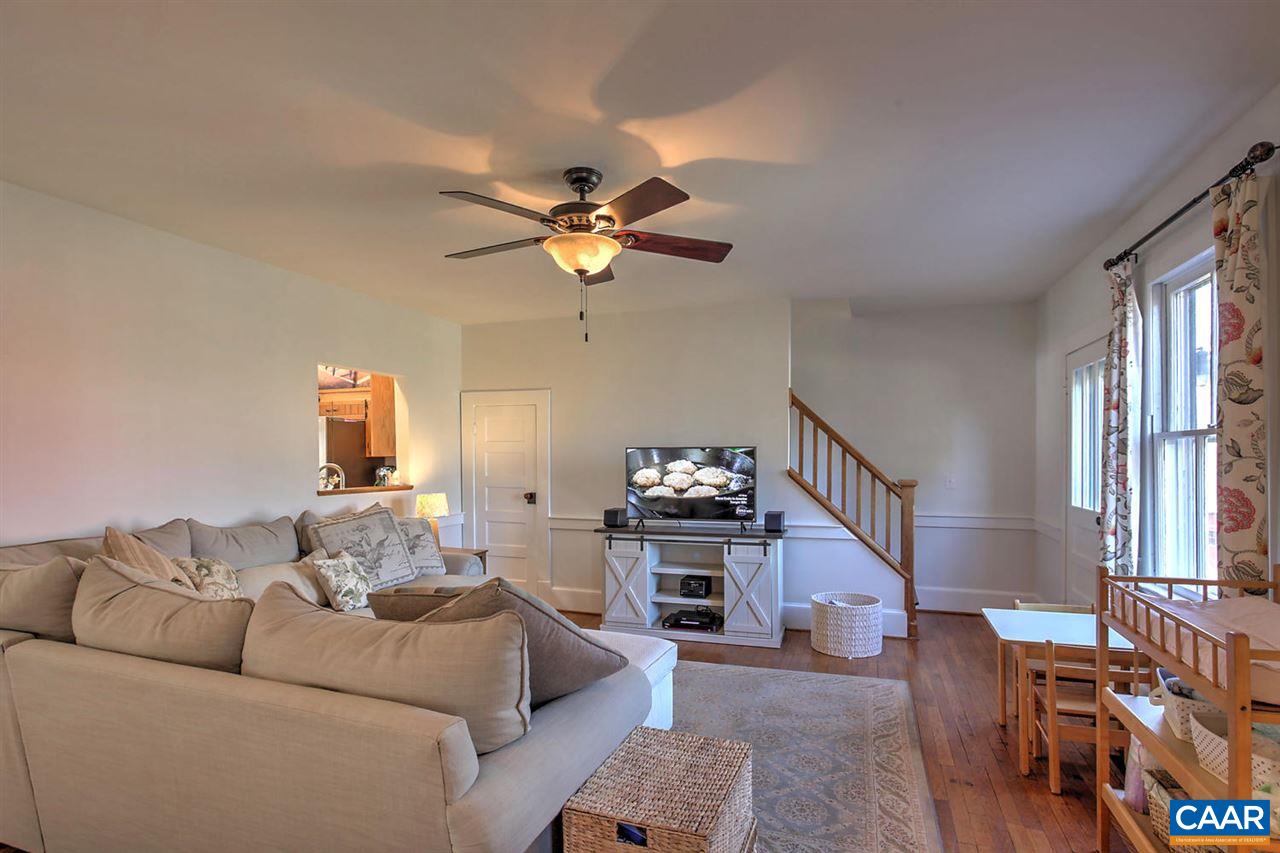 481 Beautiful Run Road Rochelle, VA 22738 - Photo 19 of 45 a living room with furniture and a chandelier