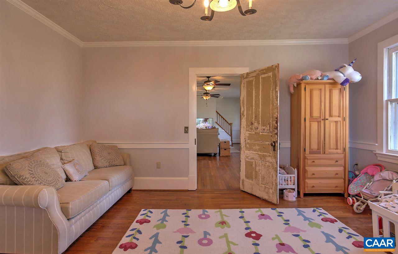 481 Beautiful Run Road Rochelle, VA 22738 - Photo 20 of 45 a living room with furniture and a rug