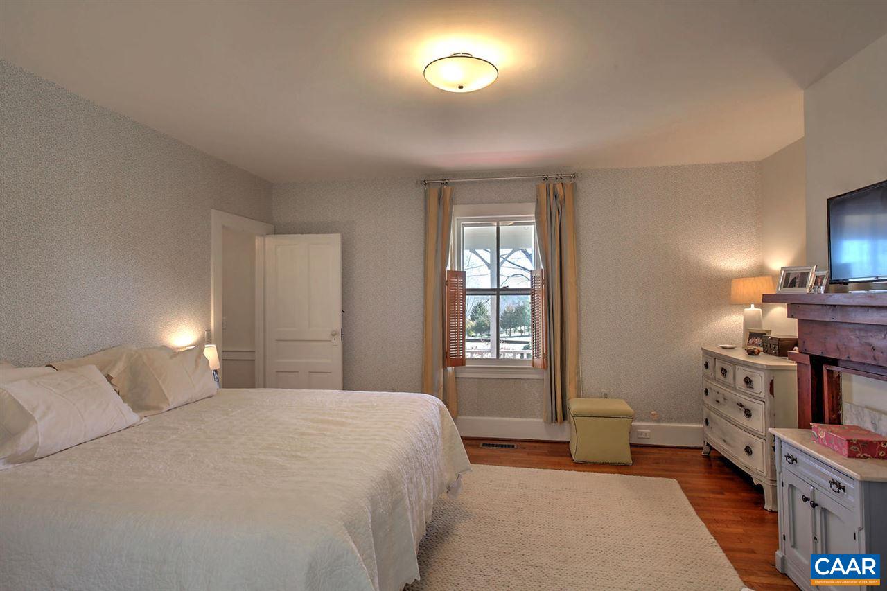 481 Beautiful Run Road Rochelle, VA 22738 - Photo 22 of 45 a bedroom with a bed dresser and a window