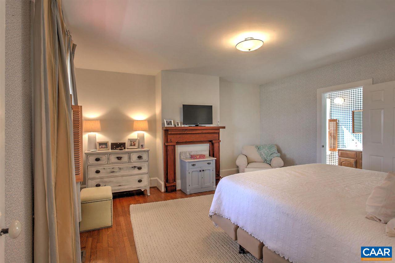 481 Beautiful Run Road Rochelle, VA 22738 - Photo 23 of 45 a bedroom with a bed and a television