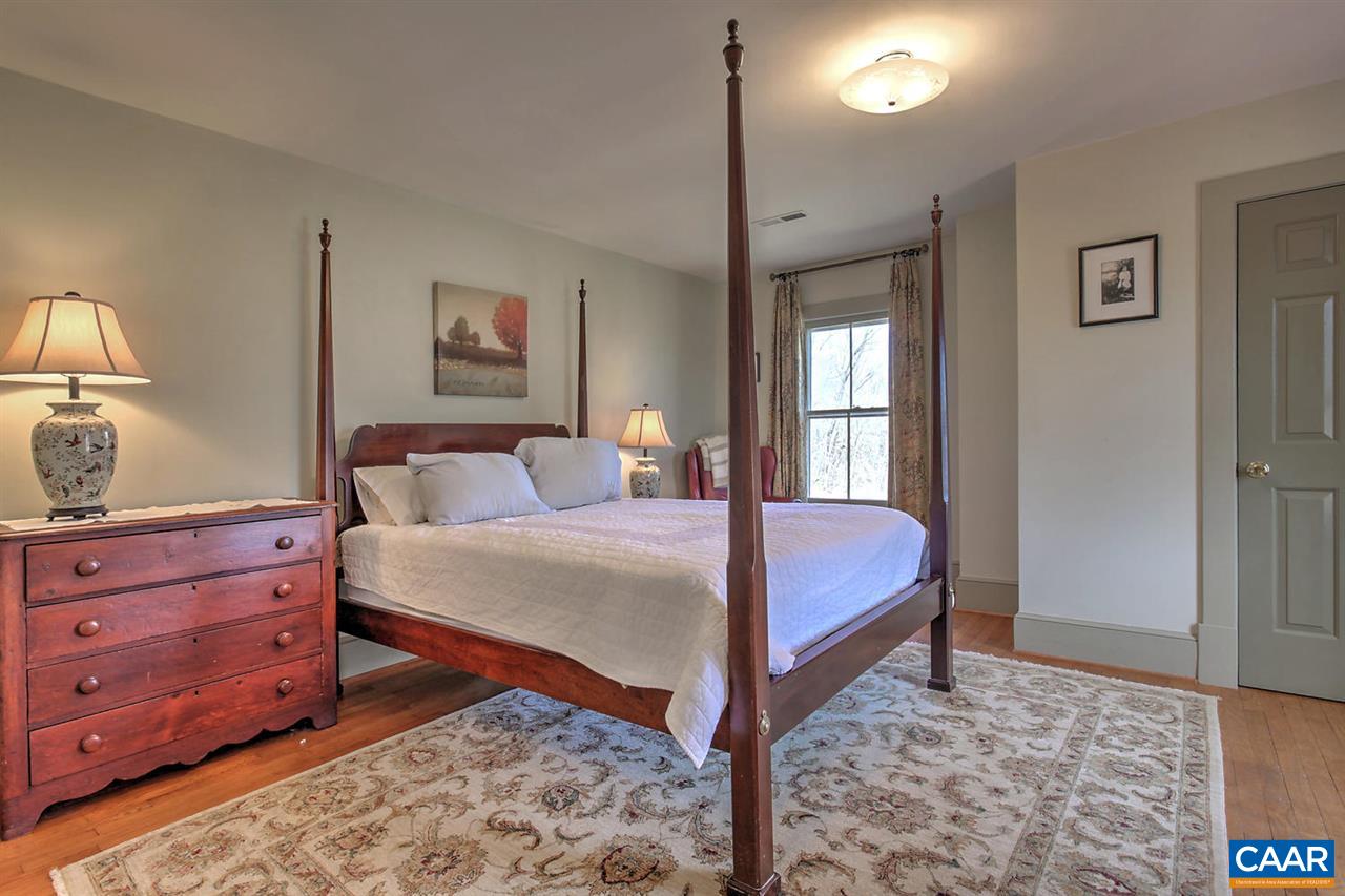 481 Beautiful Run Road Rochelle, VA 22738 - Photo 26 of 45 a bedroom with a bed and a dresser