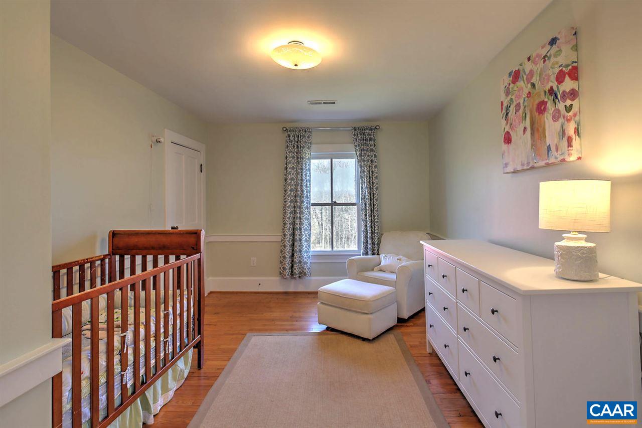 481 Beautiful Run Road Rochelle, VA 22738 - Photo 29 of 45 a bedroom with furniture and a window