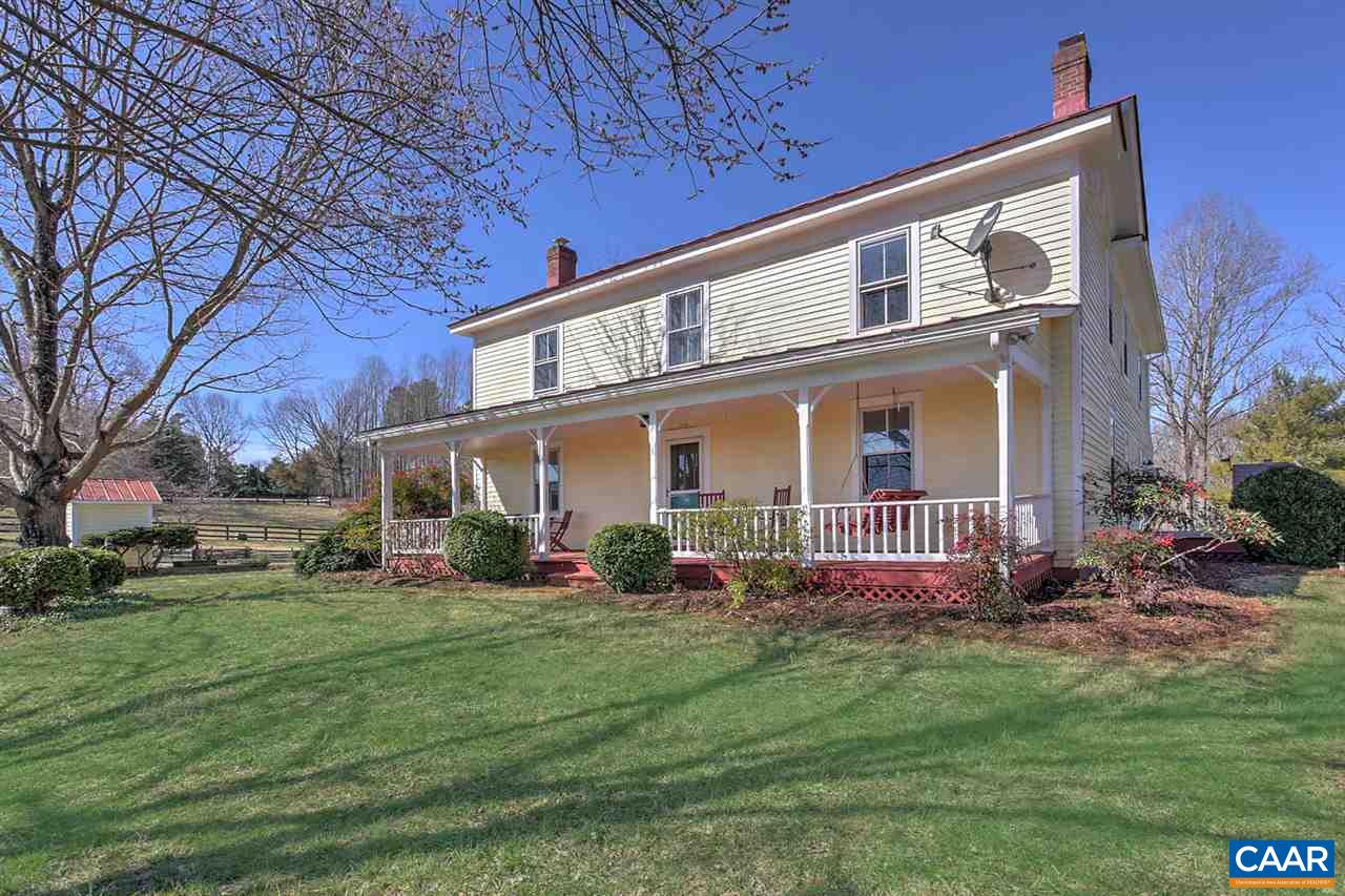 481 Beautiful Run Road Rochelle, VA 22738 - Photo 3 of 45 a front view of a house with a yard porch and outdoor seating