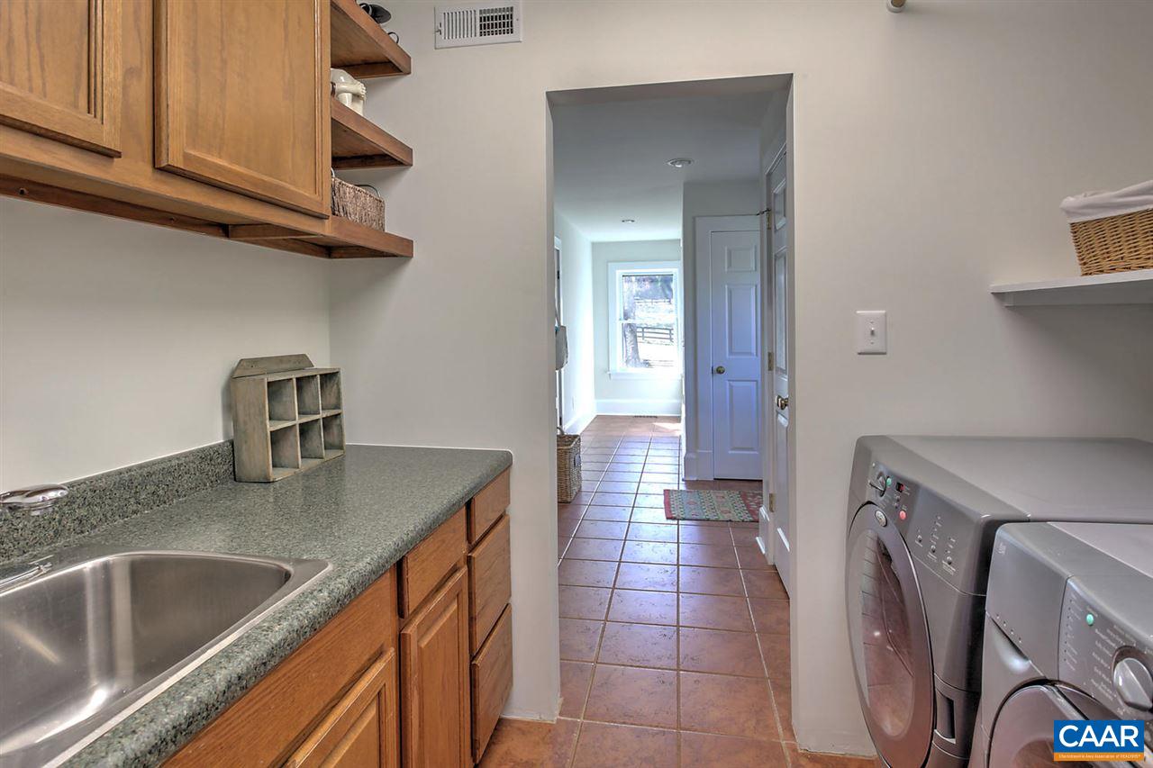 481 Beautiful Run Road Rochelle, VA 22738 - Photo 32 of 45 a kitchen with a sink and cabinets