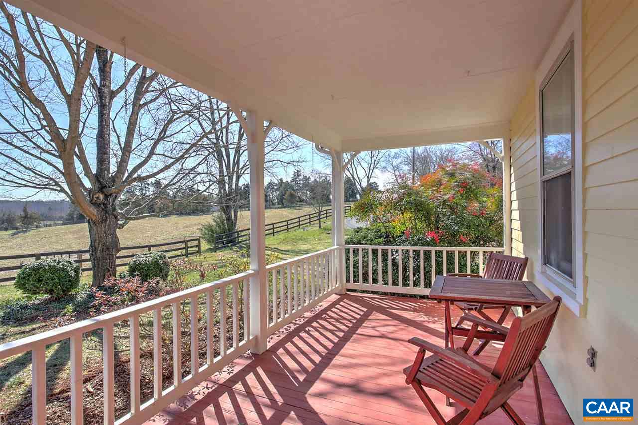 481 Beautiful Run Road Rochelle, VA 22738 - Photo 6 of 45 a view of a two chairs in the balcony