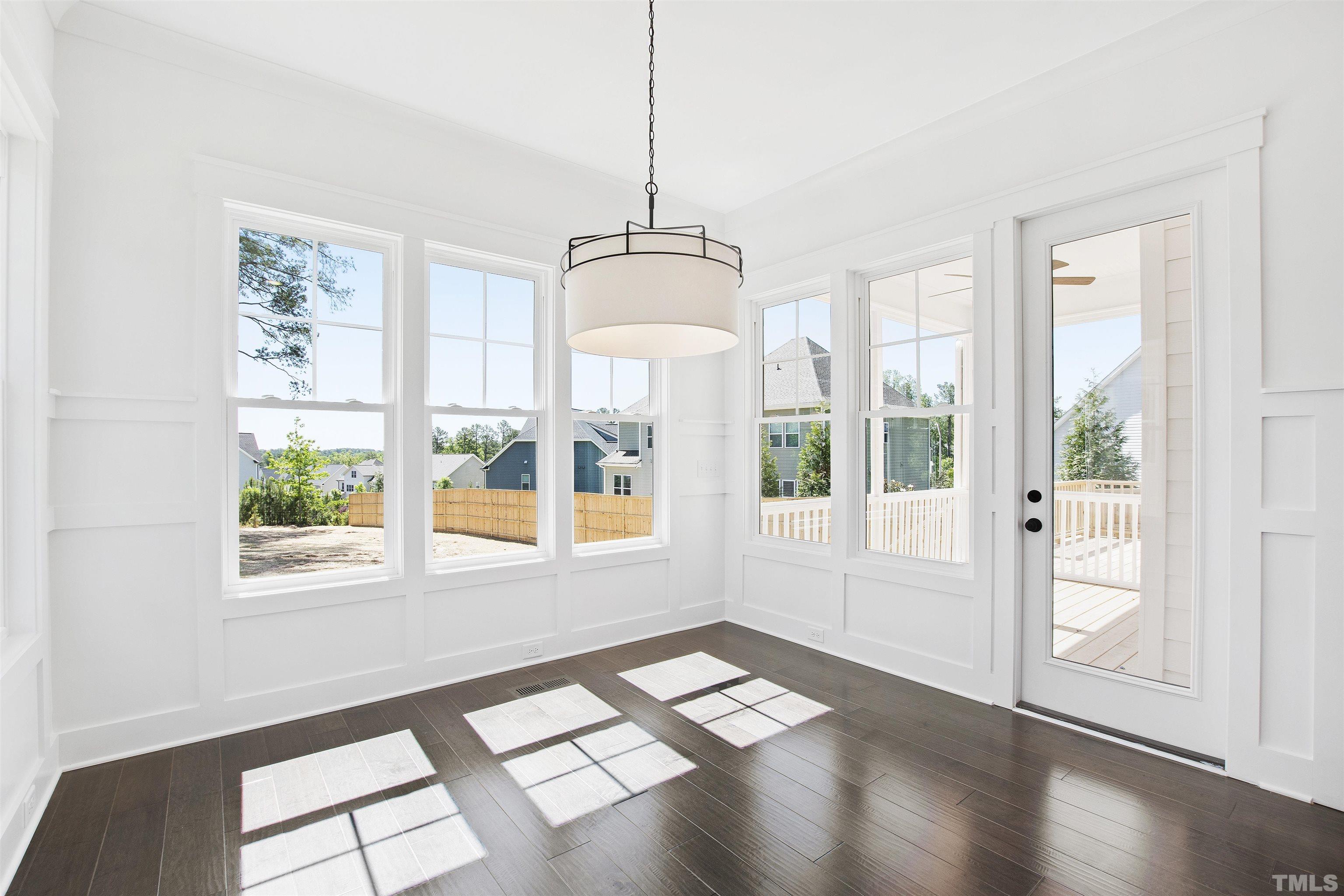7528 Pinecrest Road Raleigh, NC 27613 - Photo 16 of 45 a view of an empty room with a window