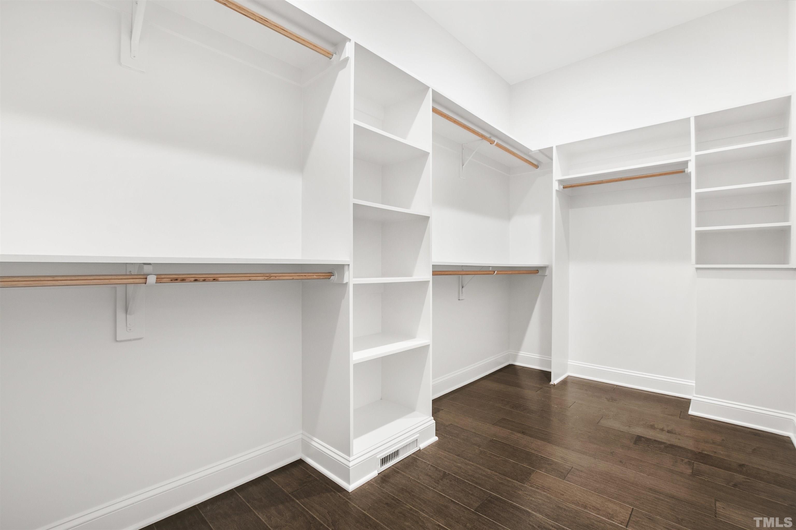 7528 Pinecrest Road Raleigh, NC 27613 - Photo 20 of 45 a view of an empty walk in closet