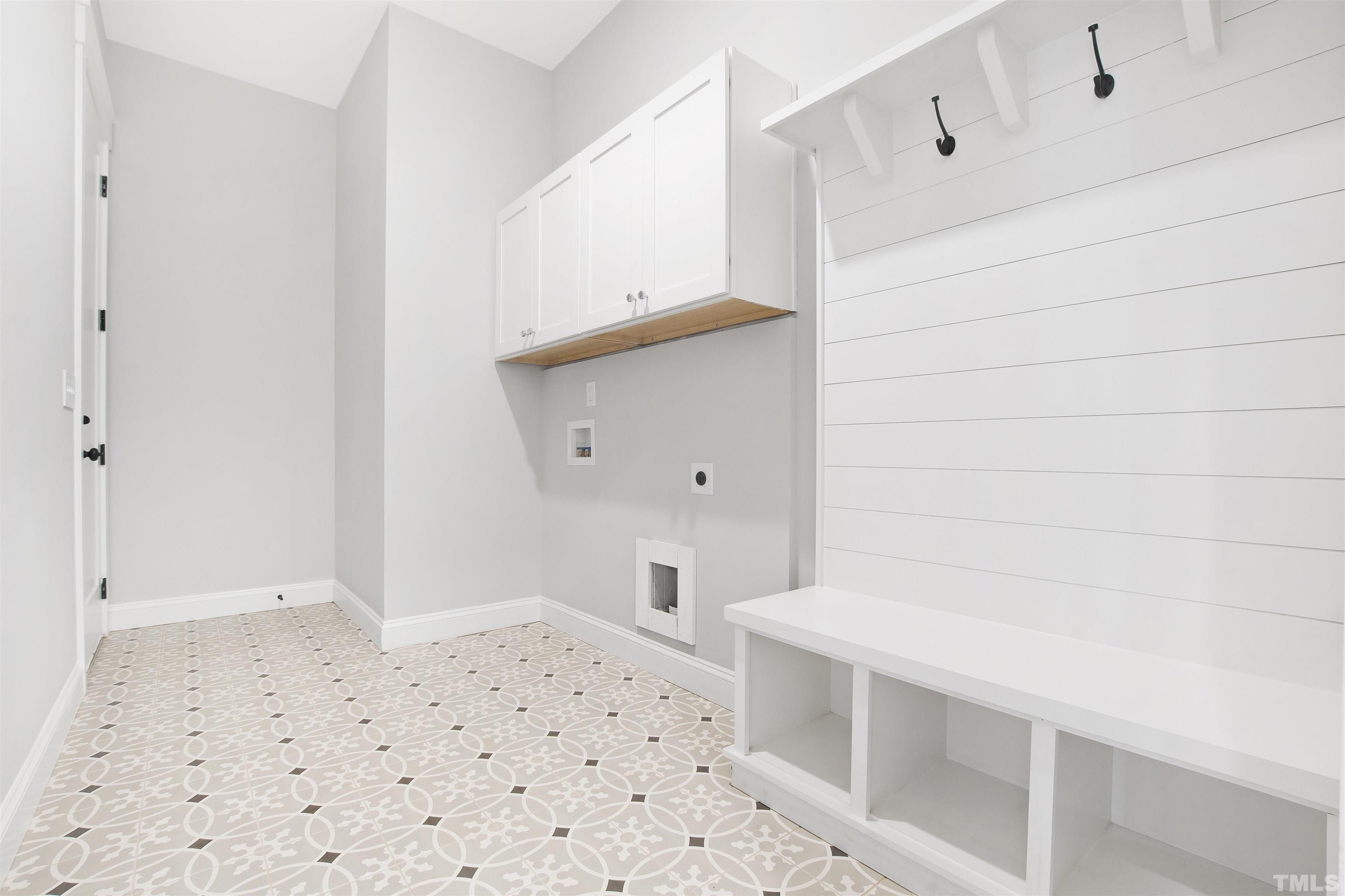 7528 Pinecrest Road Raleigh, NC 27613 - Photo 28 of 45 a bathroom with a bathtub and shower