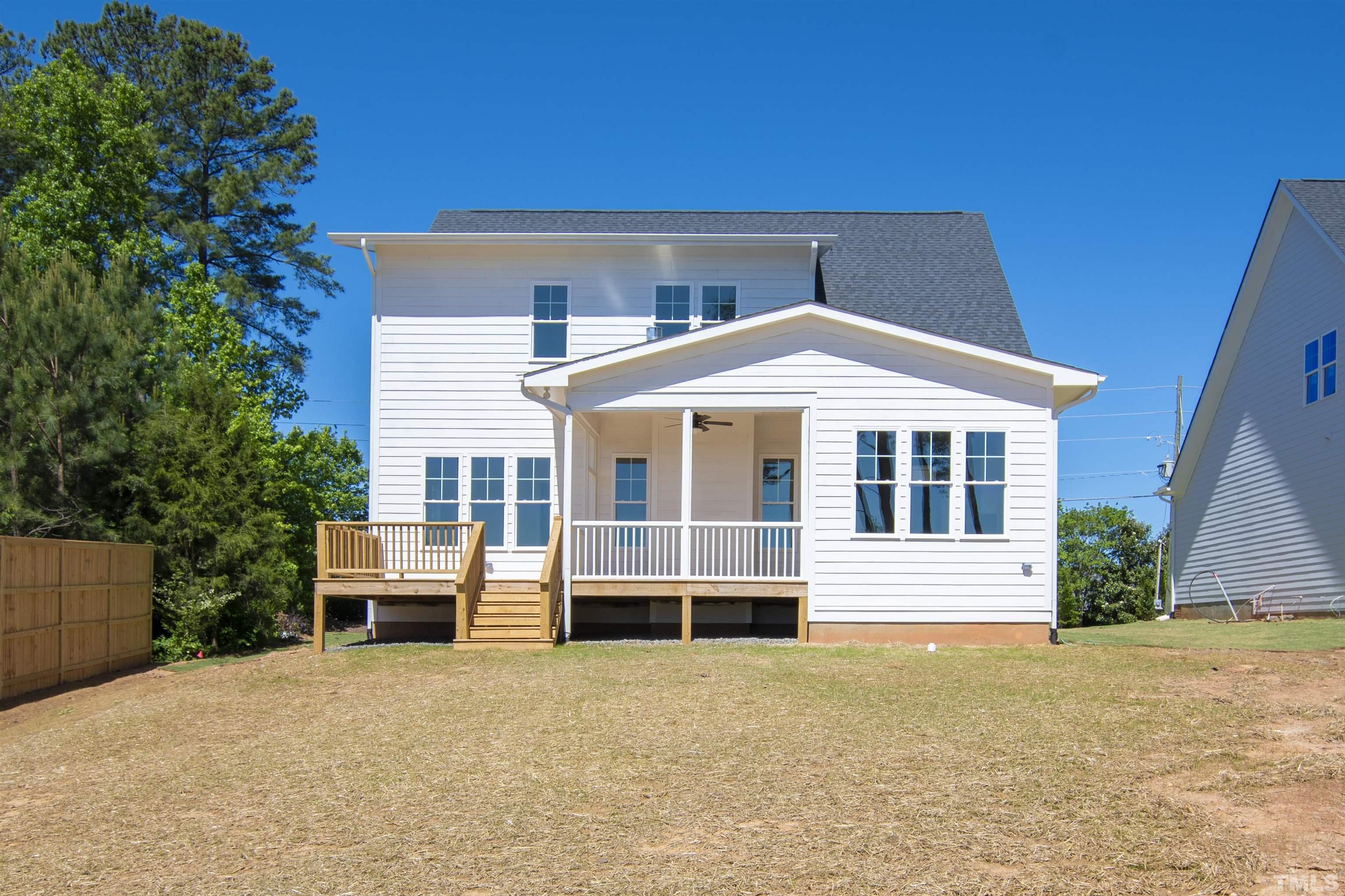 7528 Pinecrest Road Raleigh, NC 27613 - Photo 44 of 45 a front view of a house with a yard