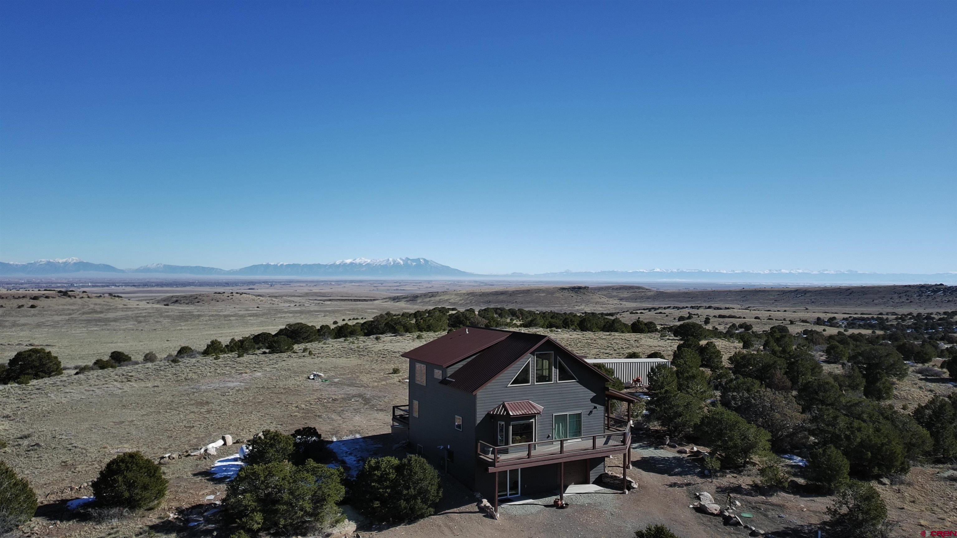 180 Boulder Lake Road Monte Vista, CO 81144 - Photo 30 of 35 an aerial view of a house with a ocean view