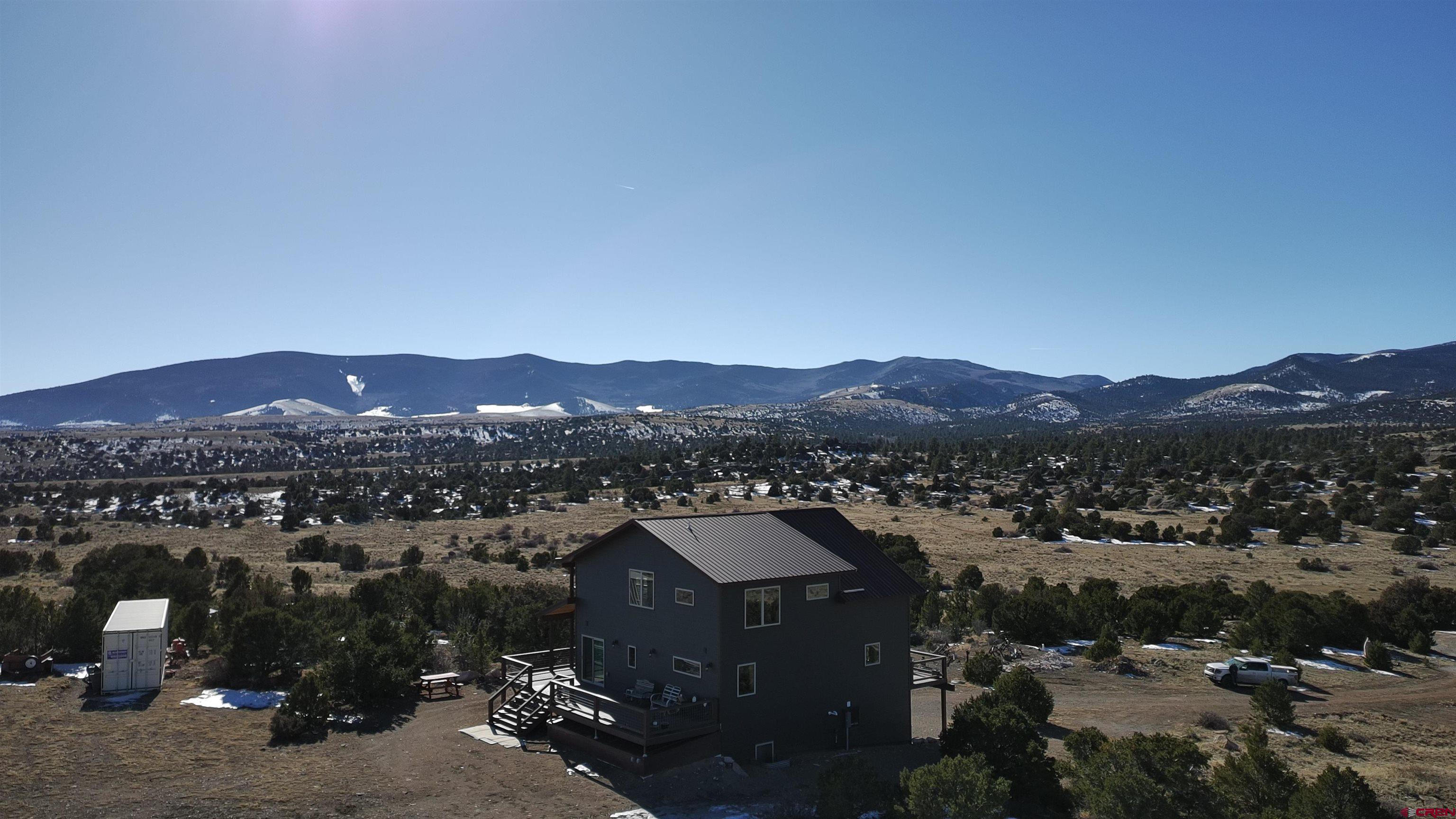180 Boulder Lake Road Monte Vista, CO 81144 - Photo 34 of 35 a view of a city with a mountain