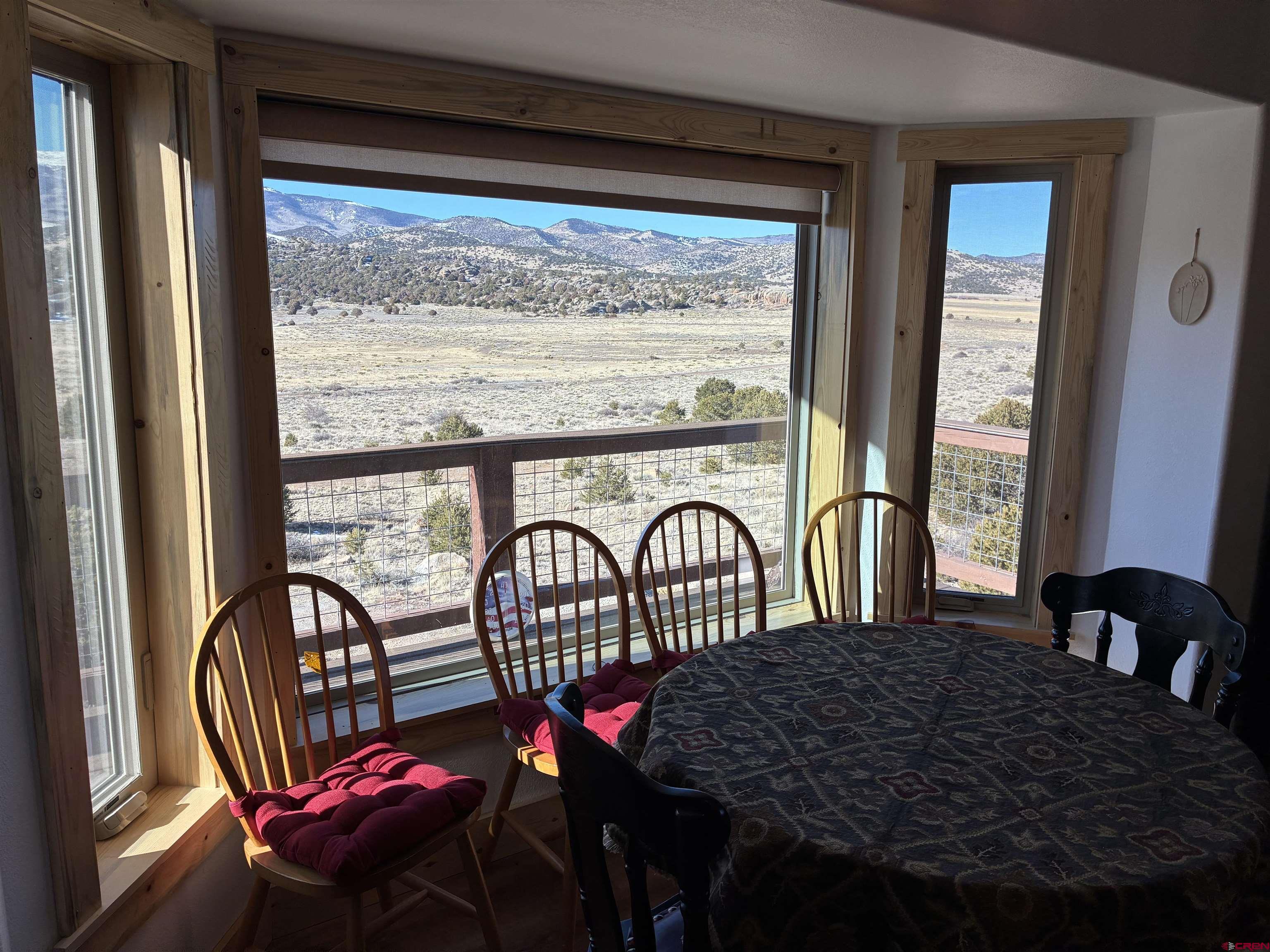 180 Boulder Lake Road Monte Vista, CO 81144 - Photo 9 of 35 a view of a balcony dining area