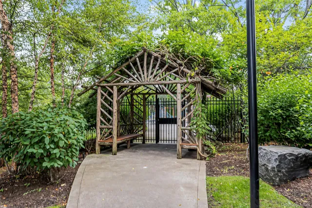 a view of an chairs and table in the patio