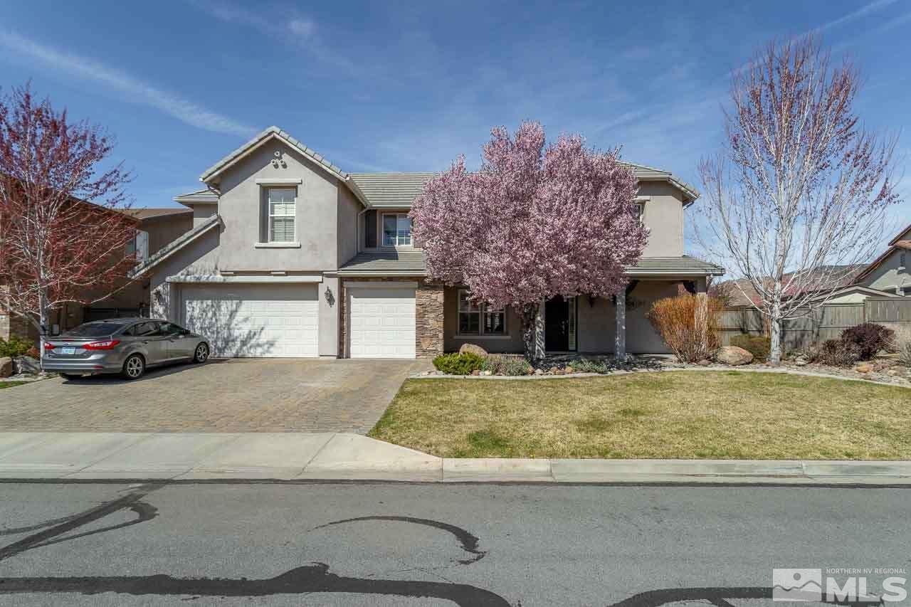 621 Steeplechase Court Reno, NV 89521 - Photo 1 of 18 a view of a house with a yard