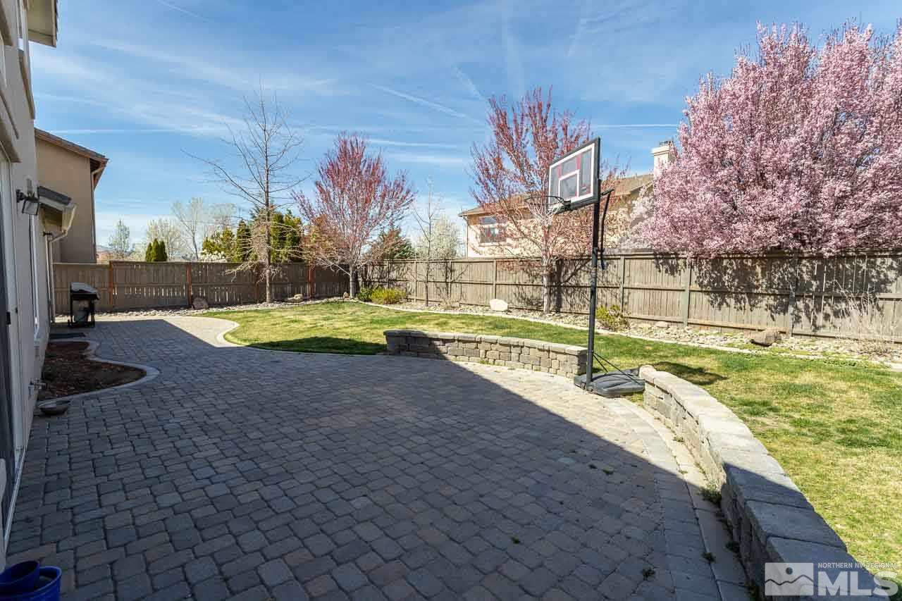 621 Steeplechase Court Reno, NV 89521 - Photo 15 of 18 a view of a park with swings and slides
