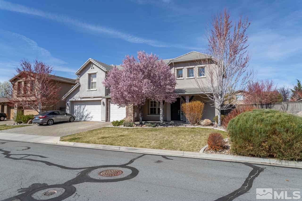 621 Steeplechase Court Reno, NV 89521 - Photo 17 of 18 a front view of a house with garden
