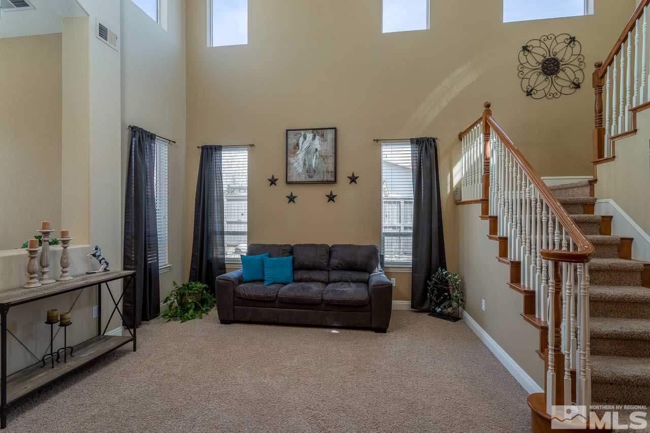621 Steeplechase Court Reno, NV 89521 - Photo 2 of 18 a living room with furniture and a window