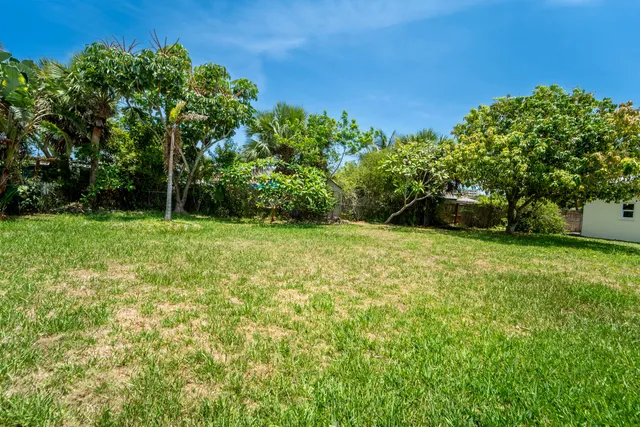 a kitchen with stainless steel appliances granite countertop wooden cabinets sink and a granite counter tops