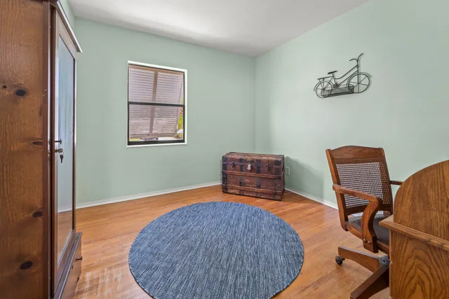 an aerial view of multiple house with ocean view