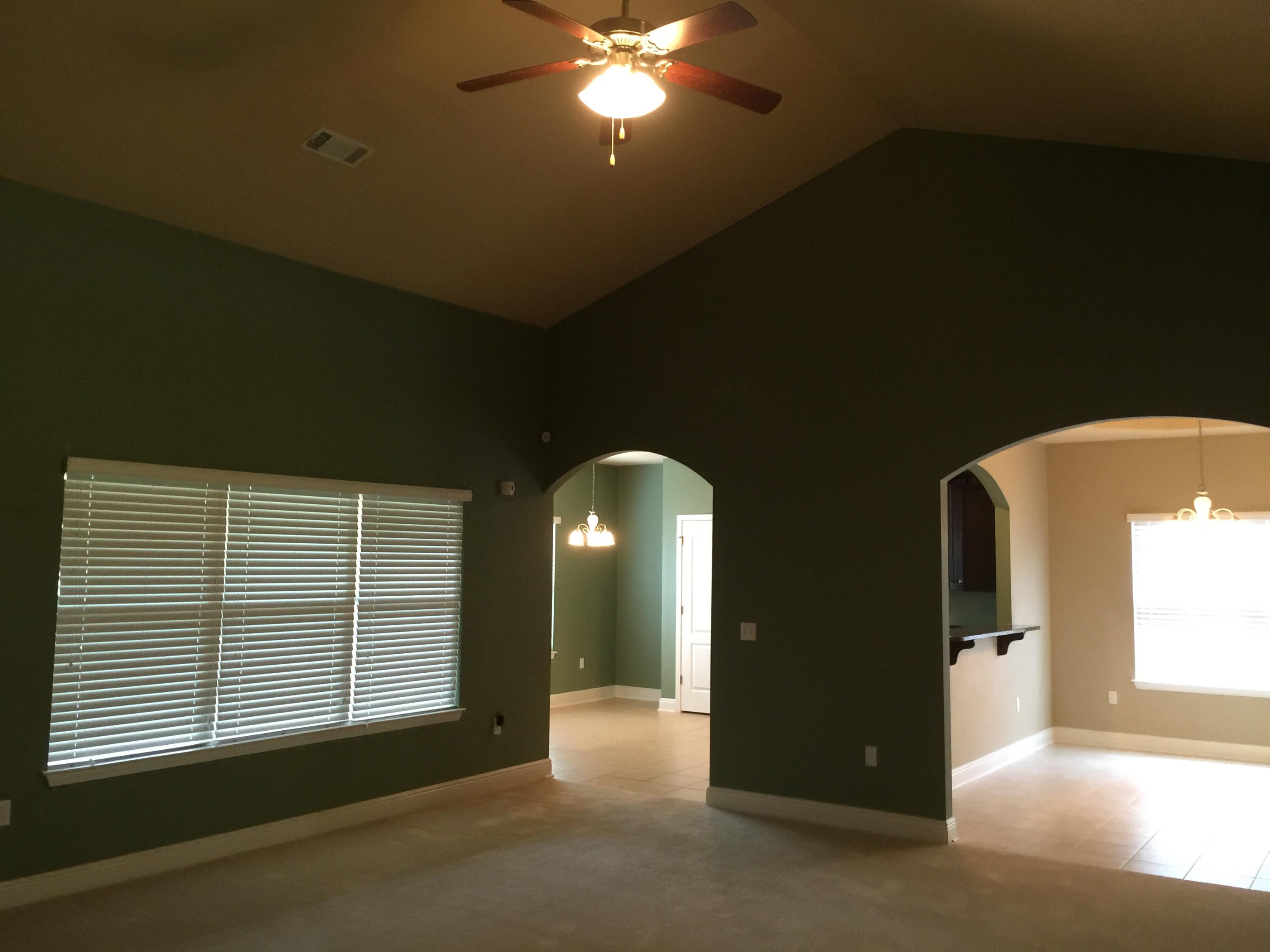 660 Red Fern Road Crestview, FL 32536 - Photo 20 of 32 a view of a livingroom with a ceiling fan and window