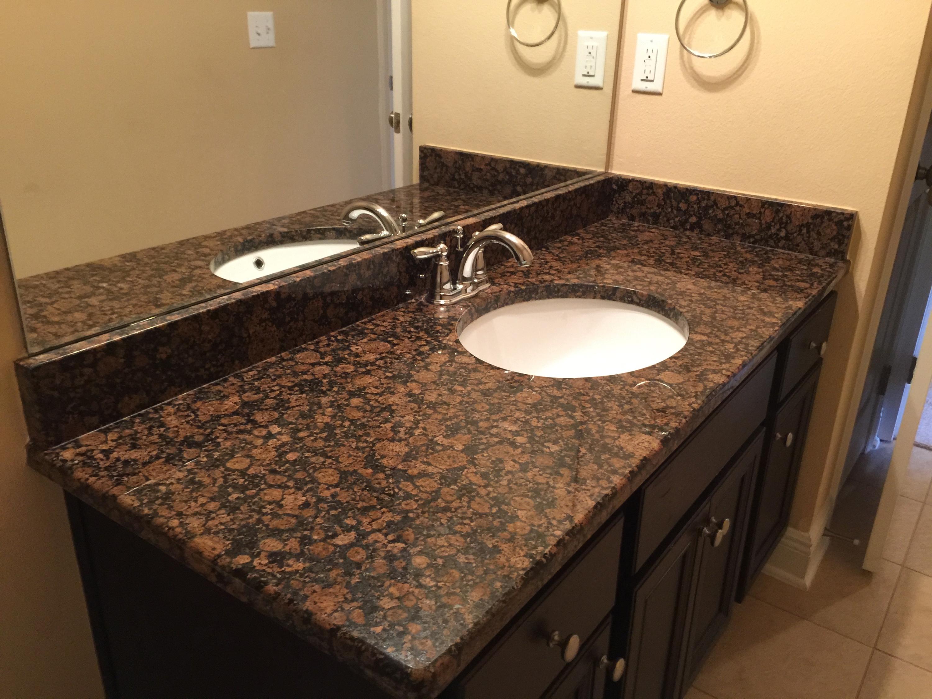 660 Red Fern Road Crestview, FL 32536 - Photo 25 of 32 a bathroom with a granite countertop sink and a mirror