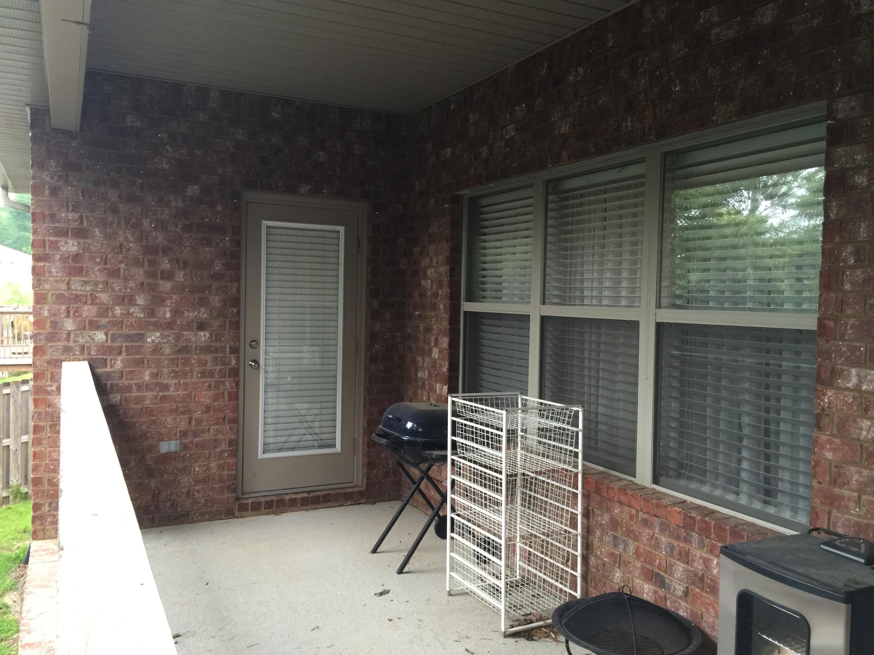 660 Red Fern Road Crestview, FL 32536 - Photo 30 of 32 a balcony with chairs and a table