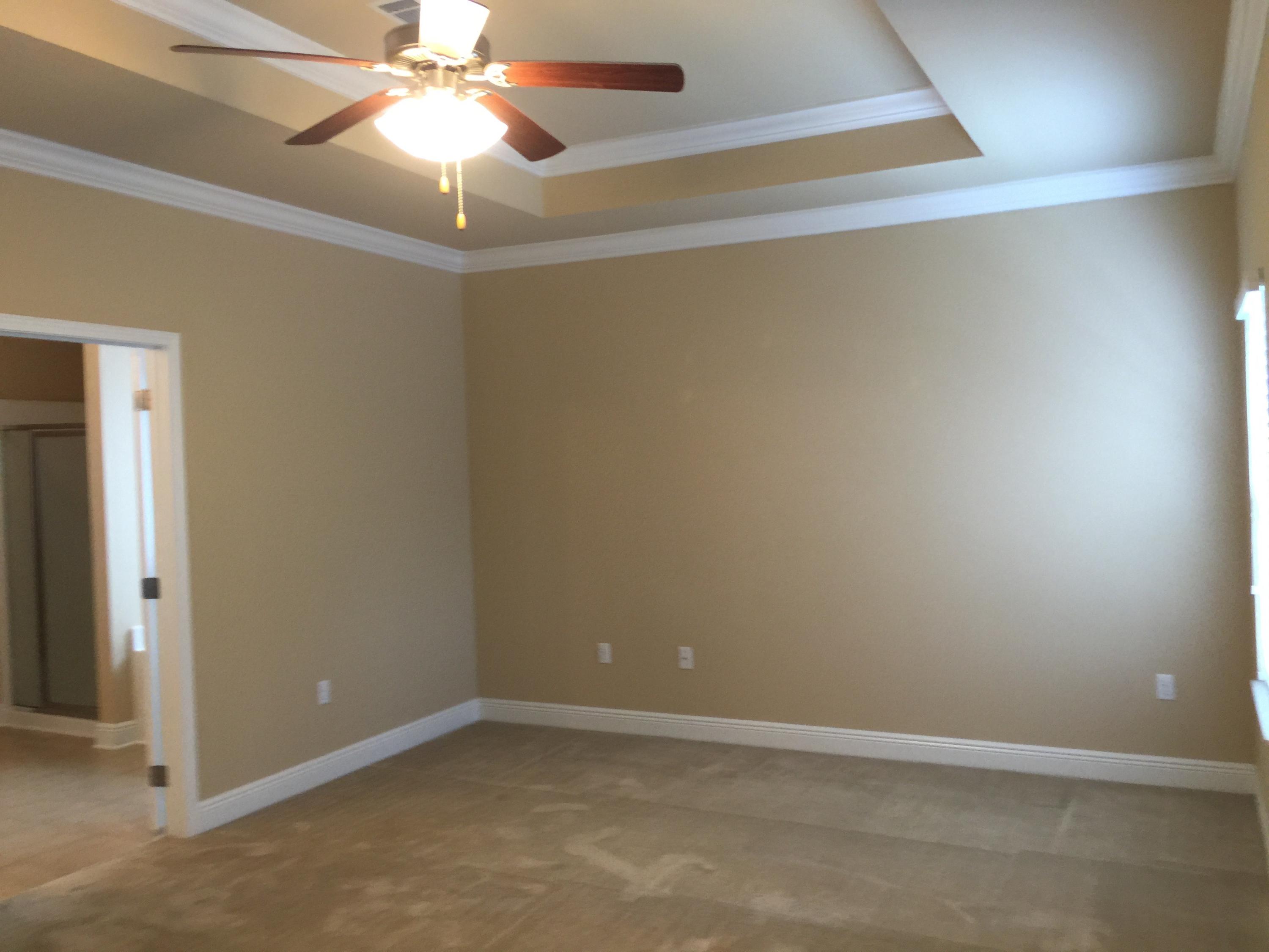 660 Red Fern Road Crestview, FL 32536 - Photo 10 of 32 an empty room with a fan and a fan