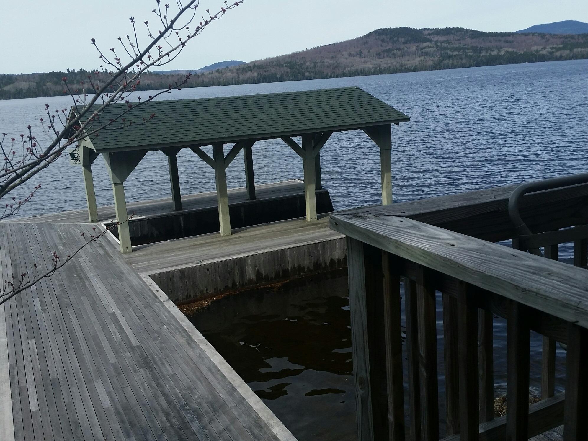 45 Bald Mountain Road Oquossoc, ME 04964 - Photo 9 of 30 400 Dock porch