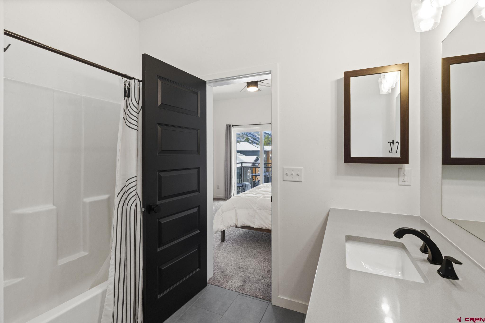 220 Metz Lane, Unit 603 Durango, CO 81301 - Photo 12 of 21 a bathroom with a bathtub