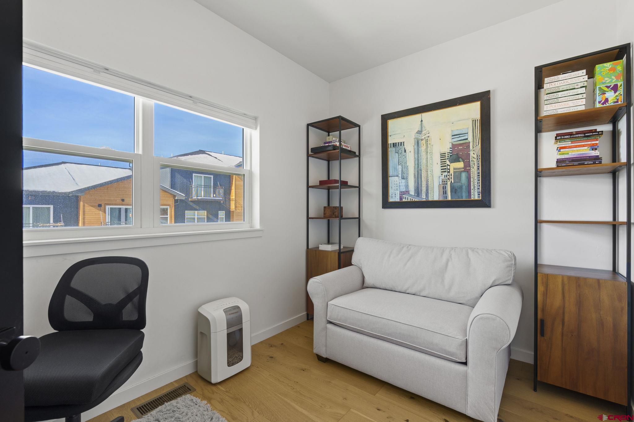 220 Metz Lane, Unit 603 Durango, CO 81301 - Photo 15 of 21 a living room with furniture and a window