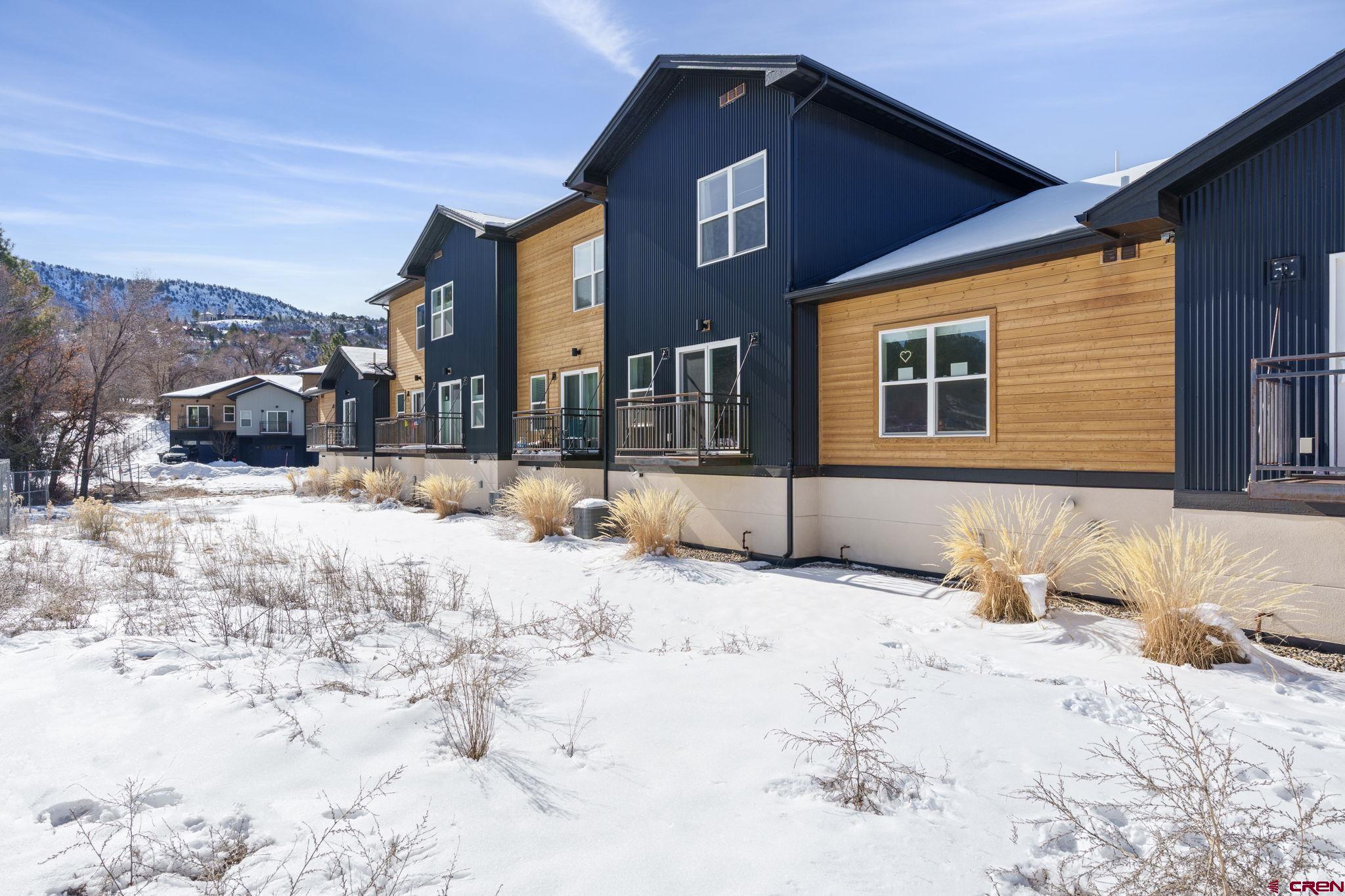 220 Metz Lane, Unit 603 Durango, CO 81301 - Photo 21 of 21 a view of a yard covered in snow