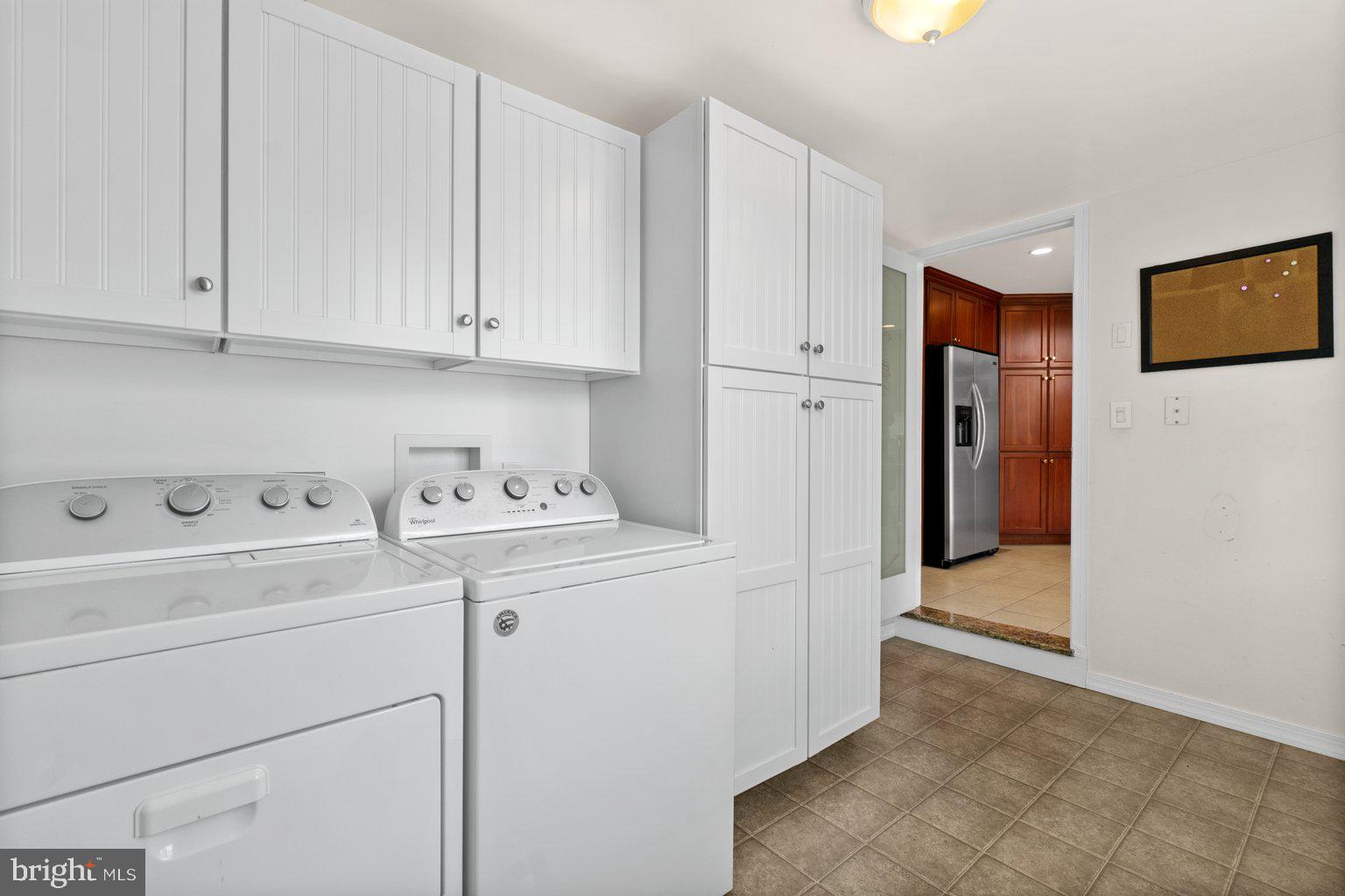 3924 New Section Road Baltimore, MD 21220 - Photo 15 of 55 Custom White Cabinets And Washer & Dryer