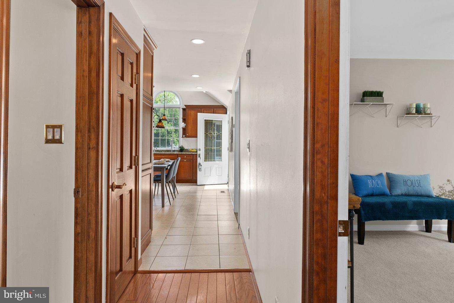 3924 New Section Road Baltimore, MD 21220 - Photo 16 of 55 Ceramic To Hardwood Hallway