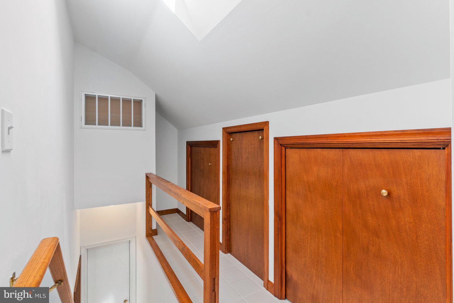 3924 New Section Road Baltimore, MD 21220 - Photo 31 of 55 Upper Level Landing With Ceramic Floor & Sky Light