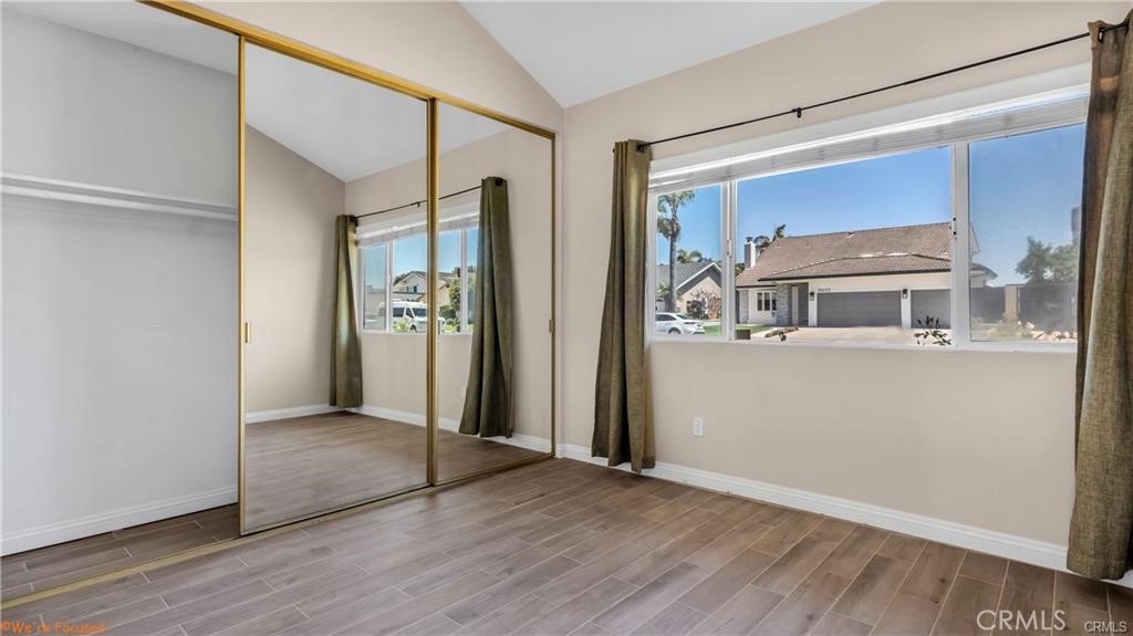 16661 Carousel Lane Huntington Beach, CA 92649 - Photo 26 of 47 a view of a big room with wooden floor and entryway
