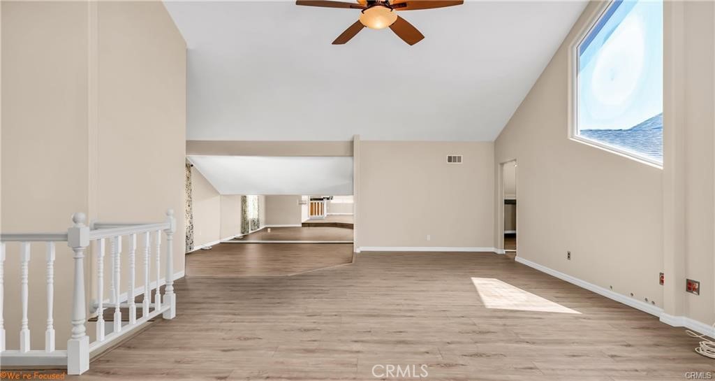 16661 Carousel Lane Huntington Beach, CA 92649 - Photo 29 of 47 a view of empty room with wooden floor
