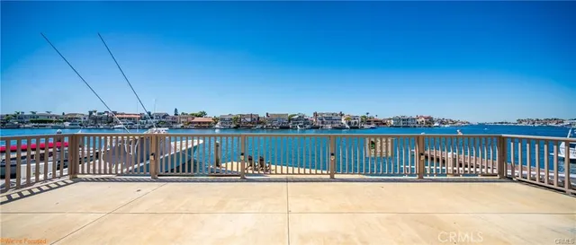 a terrace of a house with outdoor seating