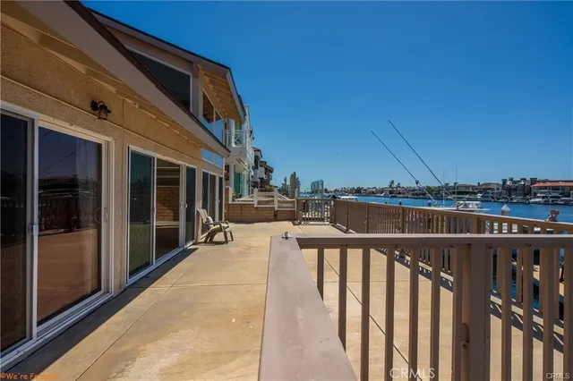 an aerial view of a house with a lake view