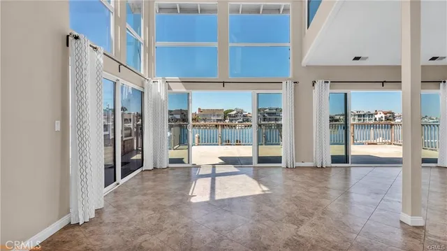 a view of an entryway with a floor to ceiling window