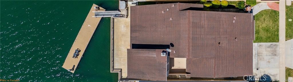 16661 Carousel Lane Huntington Beach, CA 92649 - Photo 41 of 47 an aerial view of a house with a yard and pool
