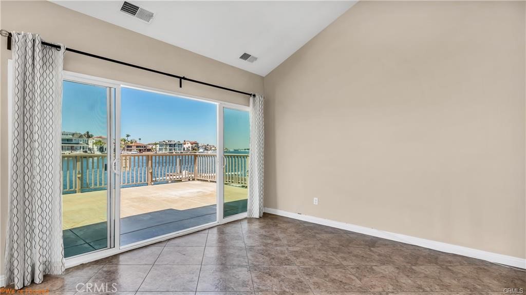 16661 Carousel Lane Huntington Beach, CA 92649 - Photo 7 of 47 a view of an empty room and window