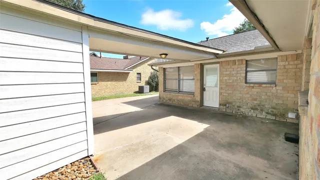 a view of a porch with a patio